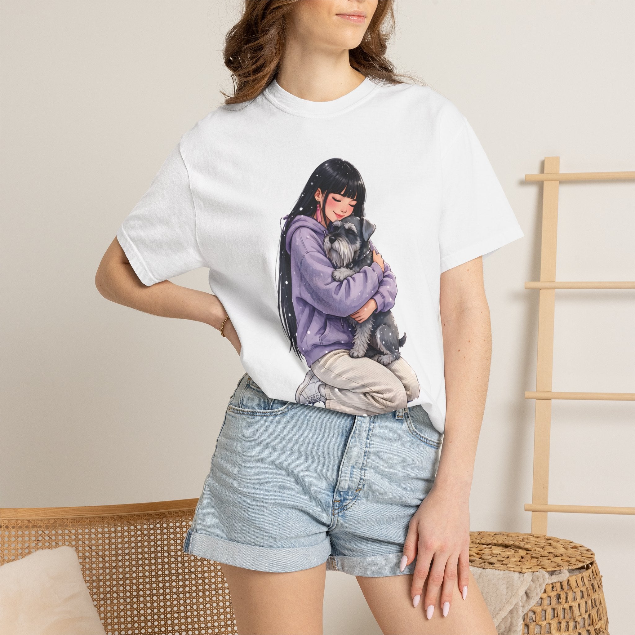 Woman wearing the white Dog Mom Hug schnauzer t-shirt with denim shorts