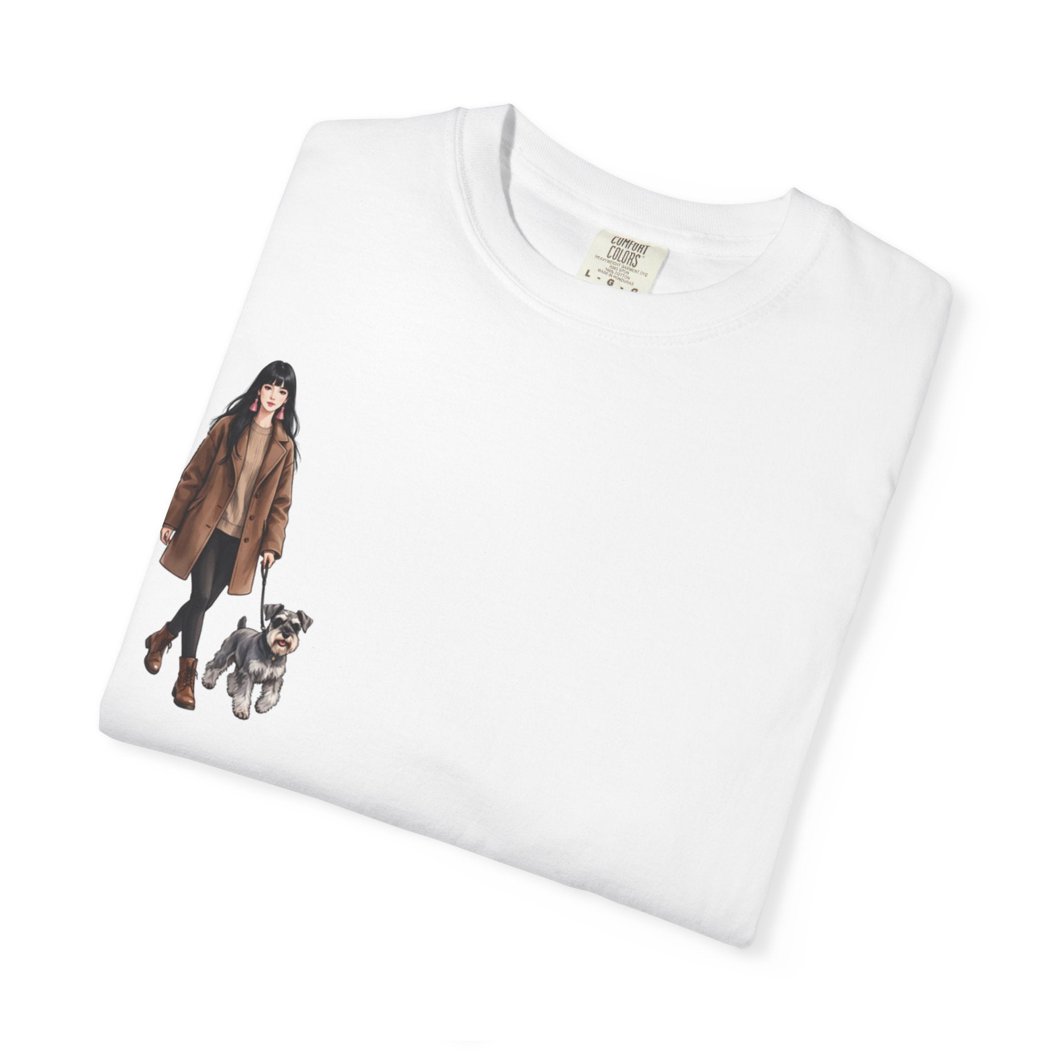 Folded white t-shirt showing the woman walking her schnauzer print